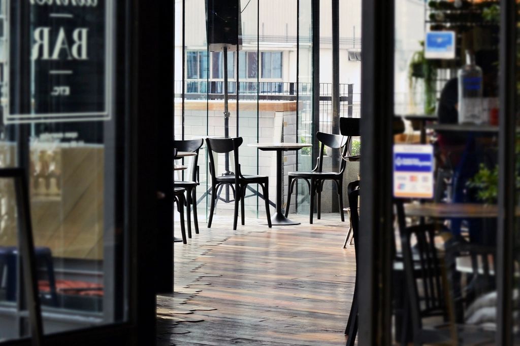 The cafe counter with stools alongside